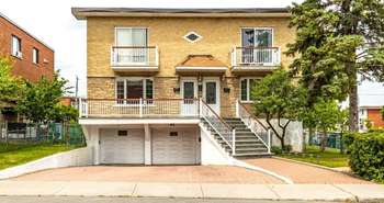 Maisons avec portes de garages en contre-pente à Montréal